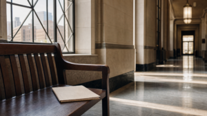 Courthouse corridor and case folder for an Oakland religious institution civil verdict article